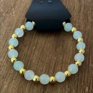 Elegant Gold and White Beaded Bracelet